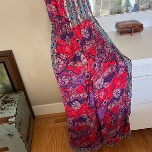 FRee people jump suit with off the shoulder sleeves!